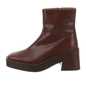 Tod’s leather platform ankle boots brown